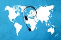 Contact global concept , top view headset and map Royalty Free Stock Photo