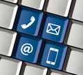 Contact Icons on Computer Keyboard Phone Email Mobile Royalty Free Stock Photo