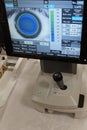 Contact lens application examination window on touchscreen monitor of modern keratometer and refractometer