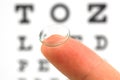 Contact lens and eye test chart Royalty Free Stock Photo