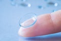 Contact lens on female finger, close up view. Medicine and vision concept Royalty Free Stock Photo