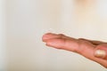 Contact lens on finger on gray background Royalty Free Stock Photo