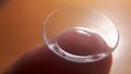 Contact lense on finger tip, macro. Contact lenses macro close up. Man holding lens on finger. Customer, patient or eye doctor, Royalty Free Stock Photo