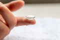 Contact lense on finger to correct nearsightedness and blurred vision eyesight by optician or oculist is to handle with hygiene Royalty Free Stock Photo