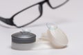 Contact lenses on case and optical glasses