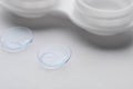 Contact lenses and case on white background, closeup Royalty Free Stock Photo