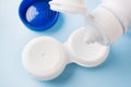Contact lenses, solution bottle and lens storage container. Close up. Selective focus Royalty Free Stock Photo