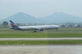 Contact point. The Russian Boeing 777-3M0 VP-BGC of the Aeroflot company makes landing at the airport of Noybay. Hanoi, Vietnam