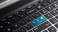 CONTACT US word with phone, email and mail icon on laptop keyboard button. Royalty Free Stock Photo
