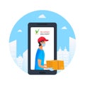 Contactless delivery to home via mobile app. E-commerce concept. Young courier holding cardboard box in protective mask