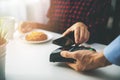 contactless payment - woman paying bill with smartphone Royalty Free Stock Photo