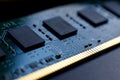 Contacts, connecting tracks and microchips of a computer RAM Random Access Memory modules close-up for electronic design.
