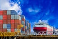 Container box stacked in port and vessel moored along side in port Royalty Free Stock Photo