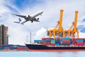 Container cargo freight ship with working crane loading bridge i