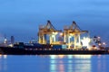 Container Cargo freight ship with working crane Royalty Free Stock Photo