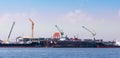 The container cargo ship is being renovated in a dock on the Chao Phraya River at Bang Pu subdistrict, Samut Prakan Royalty Free Stock Photo
