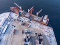 Container cargo ship loading North Arctic port. Concept freight transportation import export and business logistic Royalty Free Stock Photo