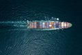 container cargo ship sailing full speed in pacific ocean to transport goods import export internationally or worldwide as business