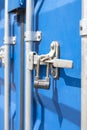 Container close-up. Blue cargo container with a lock. The concept of the increased cost of freight. Banner with place Royalty Free Stock Photo