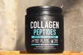 Container with collagen peptides powder