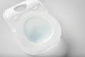 Container with contact lens on white table Royalty Free Stock Photo