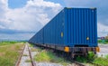 Container crane cargo freight ship with working crane loading bridge containers in shipyard at dock yard for logistic import and e Royalty Free Stock Photo