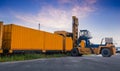 Container crane cargo freight ship with working crane loading bridge containers in shipyard at dock yard for logistic import and e Royalty Free Stock Photo