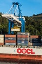 Container crane over OOCL Dalian ship, Port Chalmers New Zealand