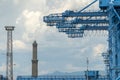 Container cranes harbour working place in genoa lanterna lighthouse