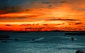 Container cranes in New York harbour at sunset and Statue of Liberty Royalty Free Stock Photo