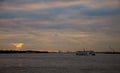 Container cranes in New York harbour at sunset and Statue of Liberty Royalty Free Stock Photo
