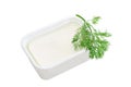 Container of feta cheese and a branch of a dill Royalty Free Stock Photo