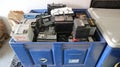 Container filled with car batteries for recycling