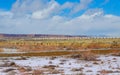 Container freight train crossing across the Canyon Diablo in the middle of the vast desert in Arizona Royalty Free Stock Photo