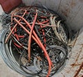 Container full of elettrical cables in the recycling center phot