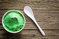 Container full of tasty green pistachio ice cream Royalty Free Stock Photo