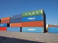 Groupm of containers stacked on pile