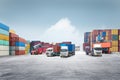 container handler loading and unloading with truck at container yard on blue sky background, Logistics import export goods Royalty Free Stock Photo