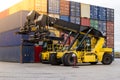 Container handlers. Forklift truck in shipping yard.