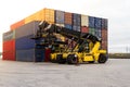 Container handlers. Forklift truck in shipping yard.