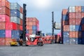 Container handlers are loading containers into trucks Royalty Free Stock Photo