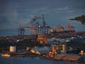 Container handling gantry crane at sunset