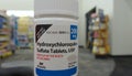 Container of Hydroxychloroquine Sulfate tablets in a drugstore. Illustrative editorial taken in Vista, CA / USA - April 9, 2020.