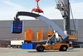 Container loader - reach stacker in the test area of Liebherr crane building factory, Rostock, Germany