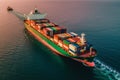 A container loading on cargo ship in open sea, freight shipping logistics, drone aerial view, export and import. Royalty Free Stock Photo