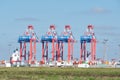 Container loading cranes in an industrial cargo port, Wilhelmshaven, Germany