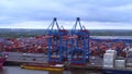 Container loading and unloading in the Port of Hamburg - aerial view - HAMBURG, GERMANY - MAY 10, 2021 Royalty Free Stock Photo