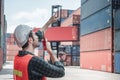 Container Logistics Shipping Management of Transportation Industry, Transport Engineer Managing Control Via Walkie Talkie in