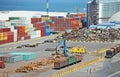 Container, lumber, pipe and train in port Royalty Free Stock Photo