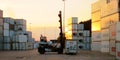 Container reach stacker moving containers around at Southampton docks UK Royalty Free Stock Photo